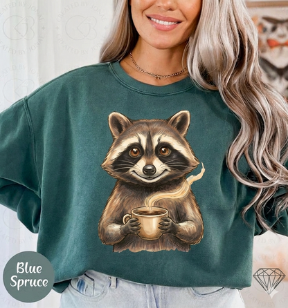 Raccoon Coffee Tee — Cute Woodland Raccoon Holding Mug Graphic T-Shirt